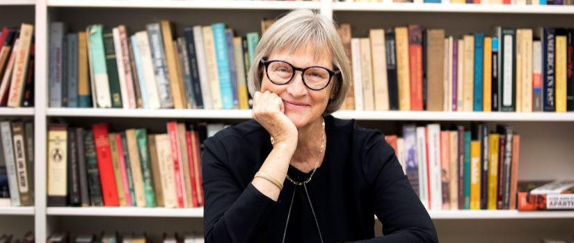 Drew Faust sitting at table