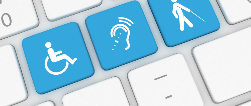Close-up of a computer keyboard with blue keys displaying accessibility icons, including a wheelchair symbol, a hearing assistance symbol, and a person using a white cane, representing digital accessibility and inclusive design.